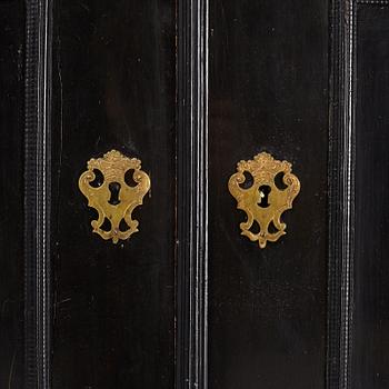 A South-German Baroque ebonized collector's cabinet on stand, circa 1700.