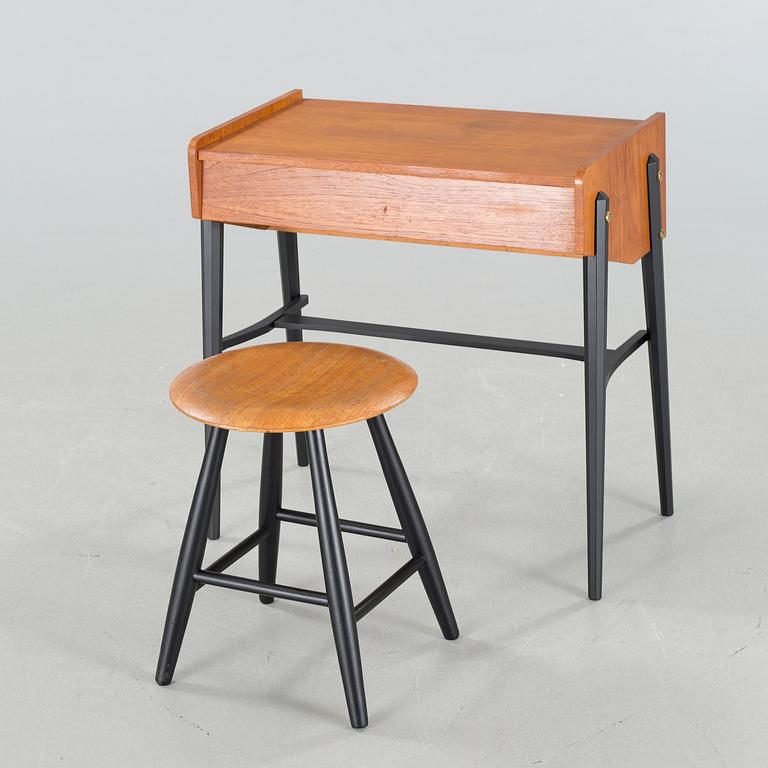 A mid 20th century dressing table and stool.