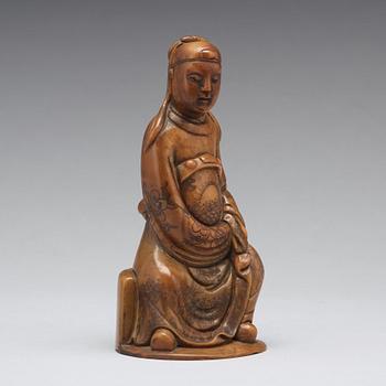 A soapstone sculpture of a mandarin official, late Qing dynasty.