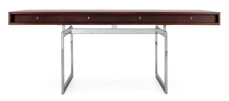 A Bodil Kjaer palisander desk on a chrome plated base, Hedensten Møbelfabrik/ E Pedersen, Denmark 1960's.