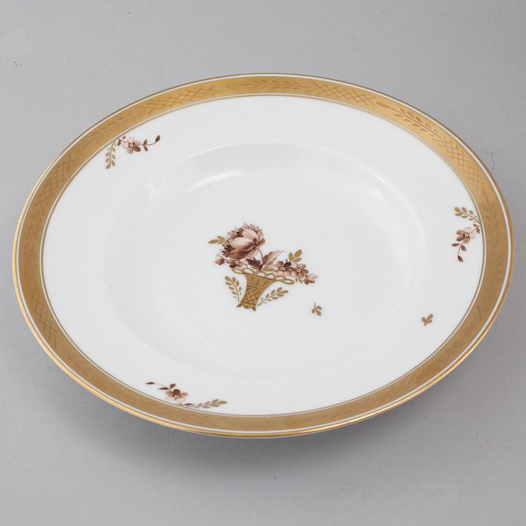 78 pieces of porcelain ware, model "Golden Baskett" by Royal Copenhagen, second half of the 20th cenutry.
