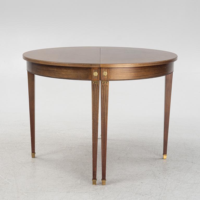 A mahogany veneered Gustavian style dining table, late 20th Century.