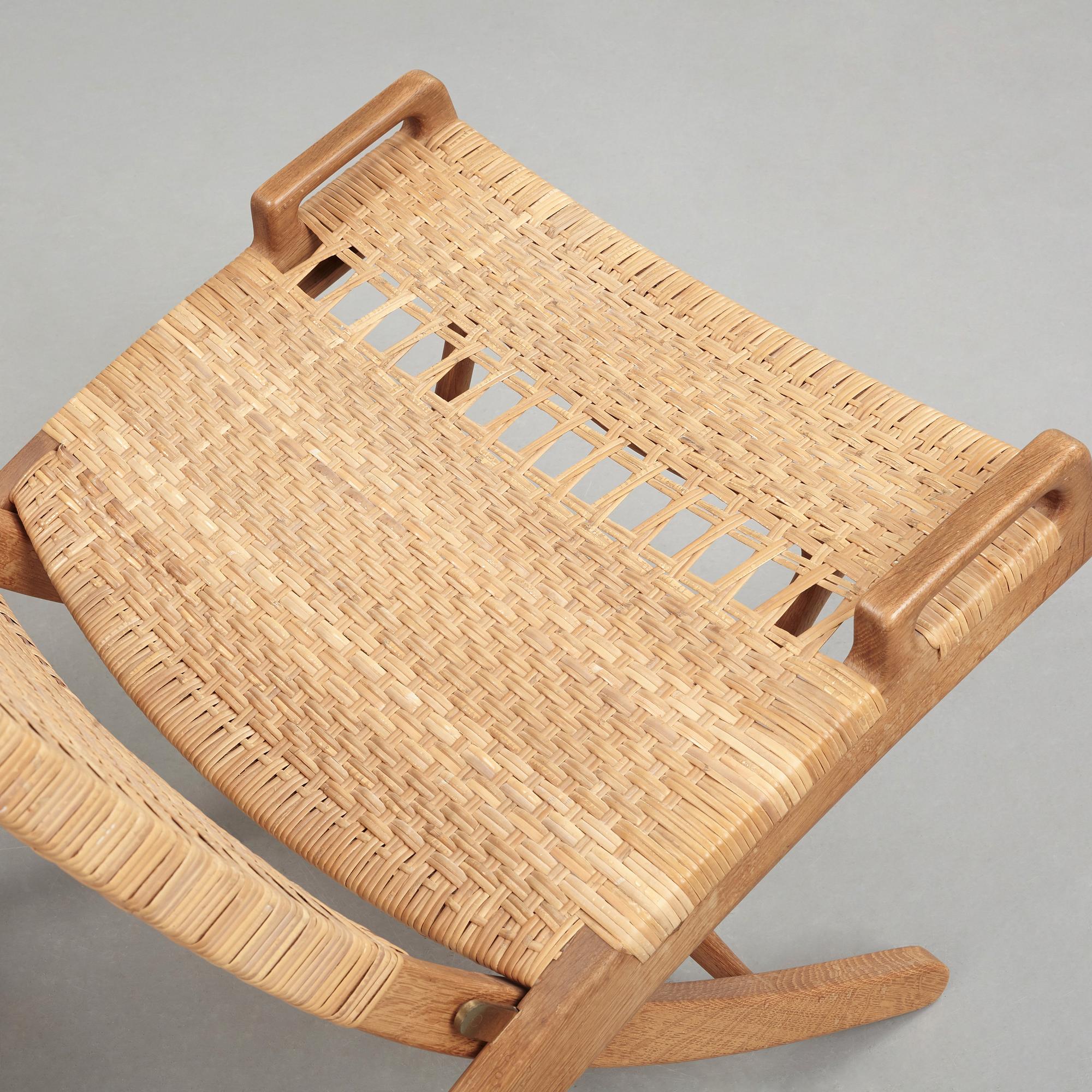 Hans J. Wegner, A pair of Hans J Wegner model 512 oak 'Folding Chairs' executed by Johannes Hansen, Denmark 1950's.