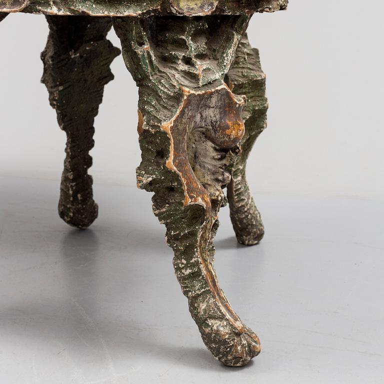 A pair of 20th century grotto armchairs.