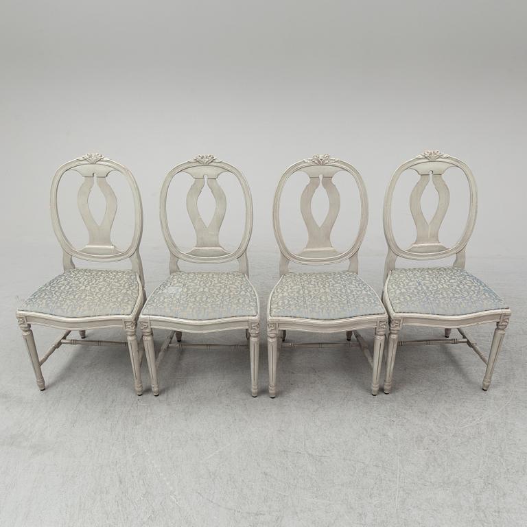 A dining table and four chairs, gustavian style, late 20th century.