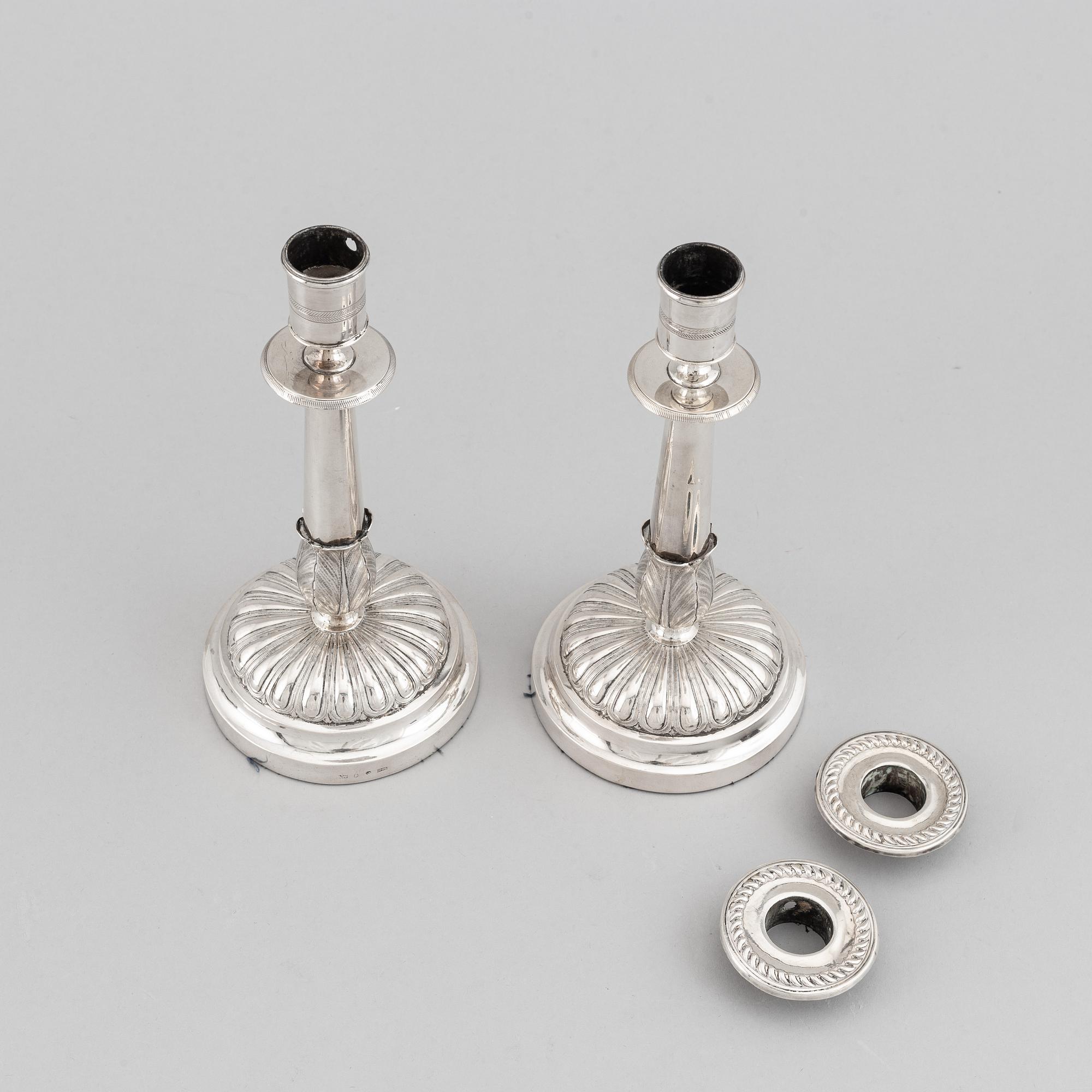 Gustaf Möllenborg, a pair of silver empire candlesticks, Stockholm 1829.