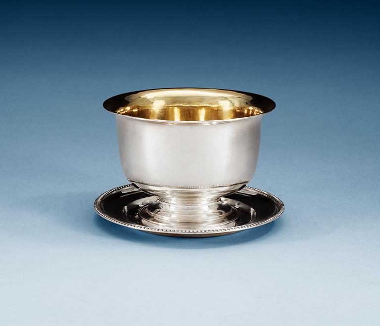 A Swedish 19th century parcel-gilt sauce-bowl, makers mark of Johan Fredrik Björnstedt, Stockholm 1825 and 1826.