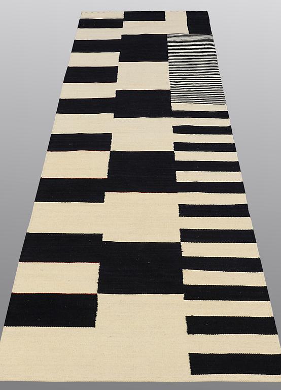 A runner, flat weave, ca 296 x 78 cm.