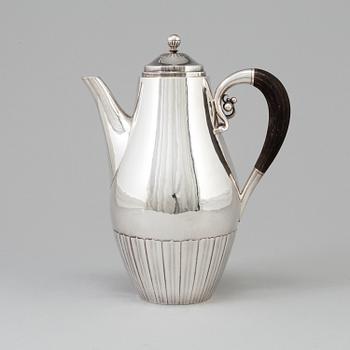A silver coffee pot, designed by Johan Rodhe for Georg Jensen, Denmark, after 1945. Weight ca 647 grams.
