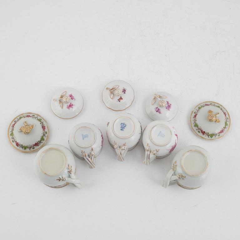 Five porcelain custard cups in various models, 19th-20th Century.