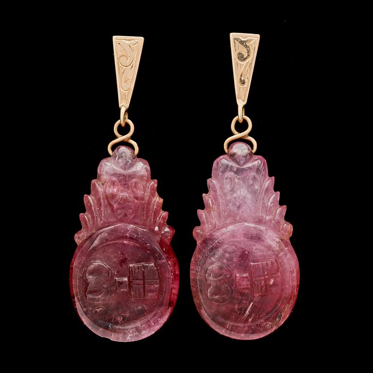 EARRINGS, cut pink tourmalines set in gold.