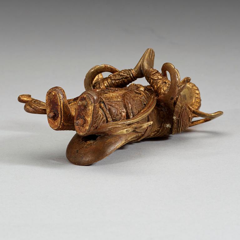 A gilt bronze figure of a Lokapala, Qing dynasty, 19th Century.