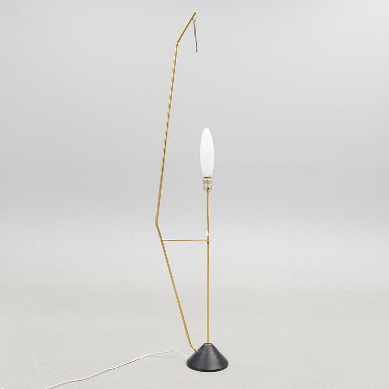 A mid-20th Century floor lamp.