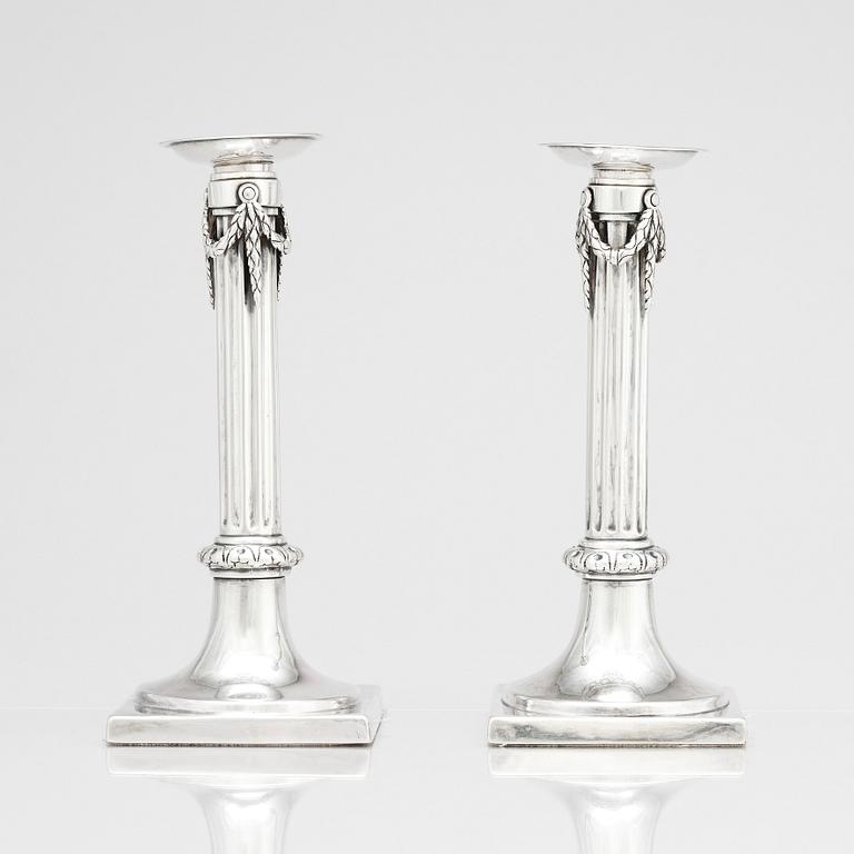 A pair of German 18th century silver candlesticks, marks of Johann Philipp Heckenauer, Augsburg 1787-1789.