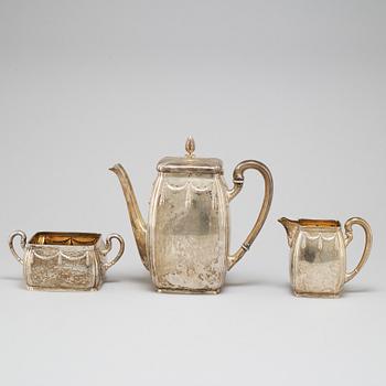 K ANDERSON, a three-piece parcel-gilt silver coffee set from Stockholm, 1911.