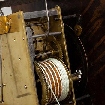 A 18th century long case clock.