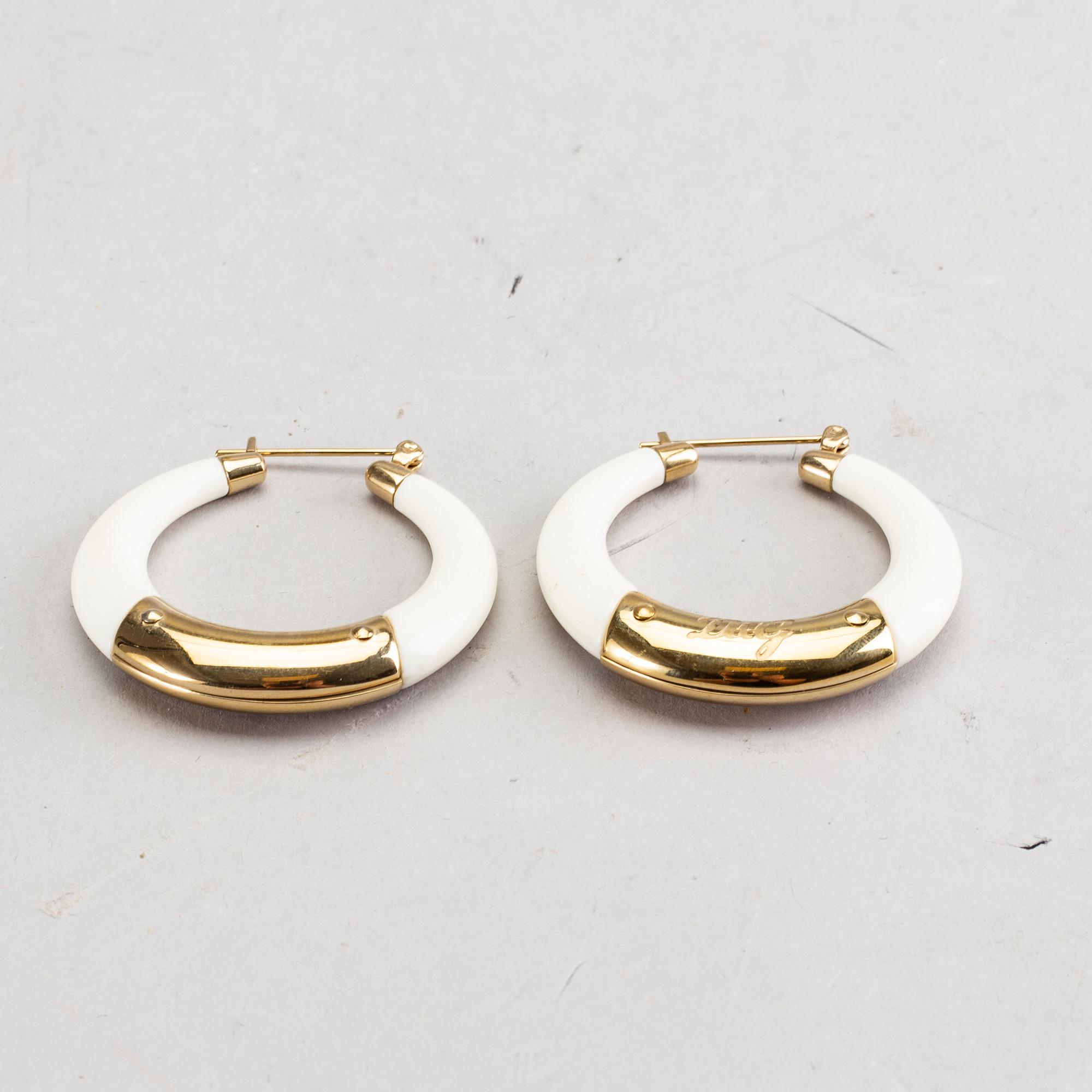 A pair of Dolce & Gabbana earrings.