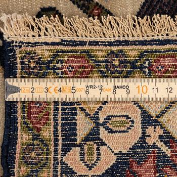 An antique Malajir rug, c. 179,5 x 124 cm (as well as one end with 2.5 cm flat weave).