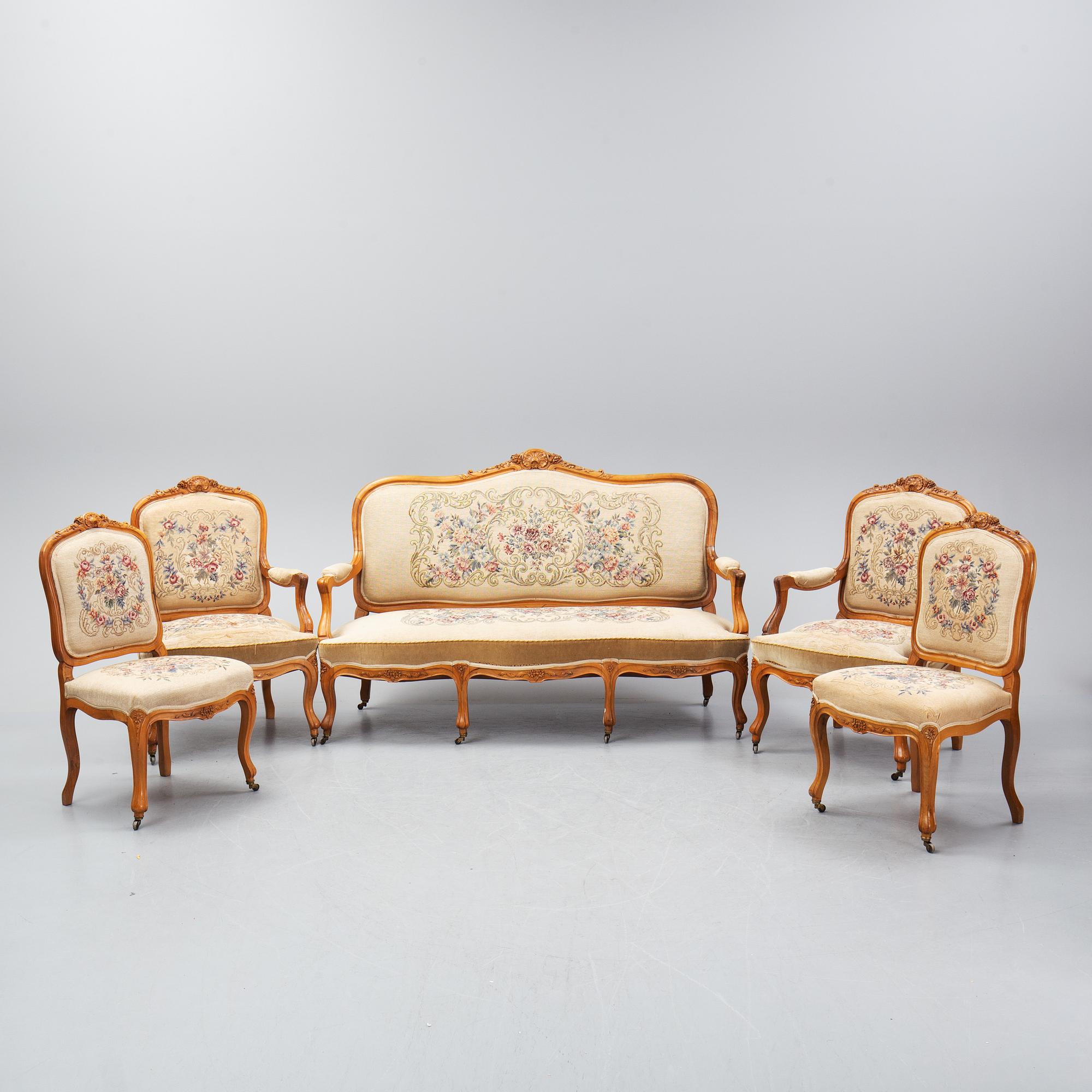 A set of sofa, two armchairs and six chairs, Louis XV-style, ca 1900.