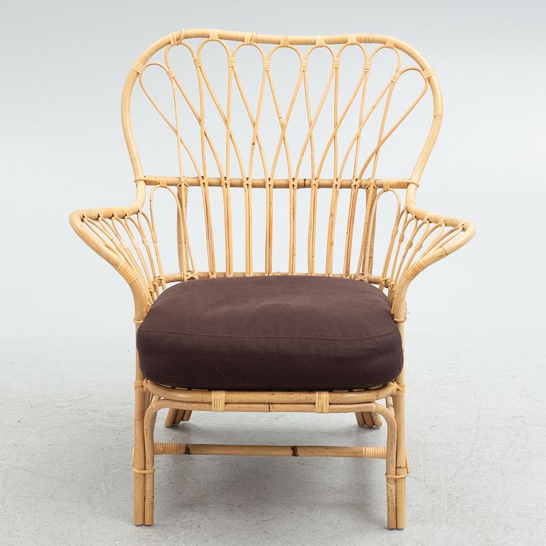 Josef Frank, armchair with footstool, model 311, Firma Svenskt Tenn.