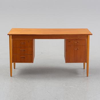 A 1950/60's oak and teak writing desk.