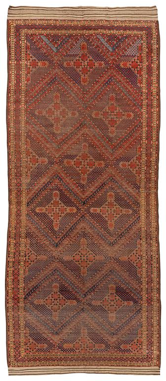 An antique Beshir carpet, ca 495 x 206 cm, around the year 1875.