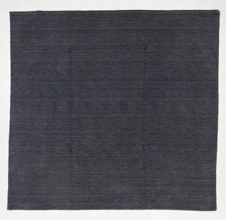 A Raj Lori rug, c. 230 x 240 cm.