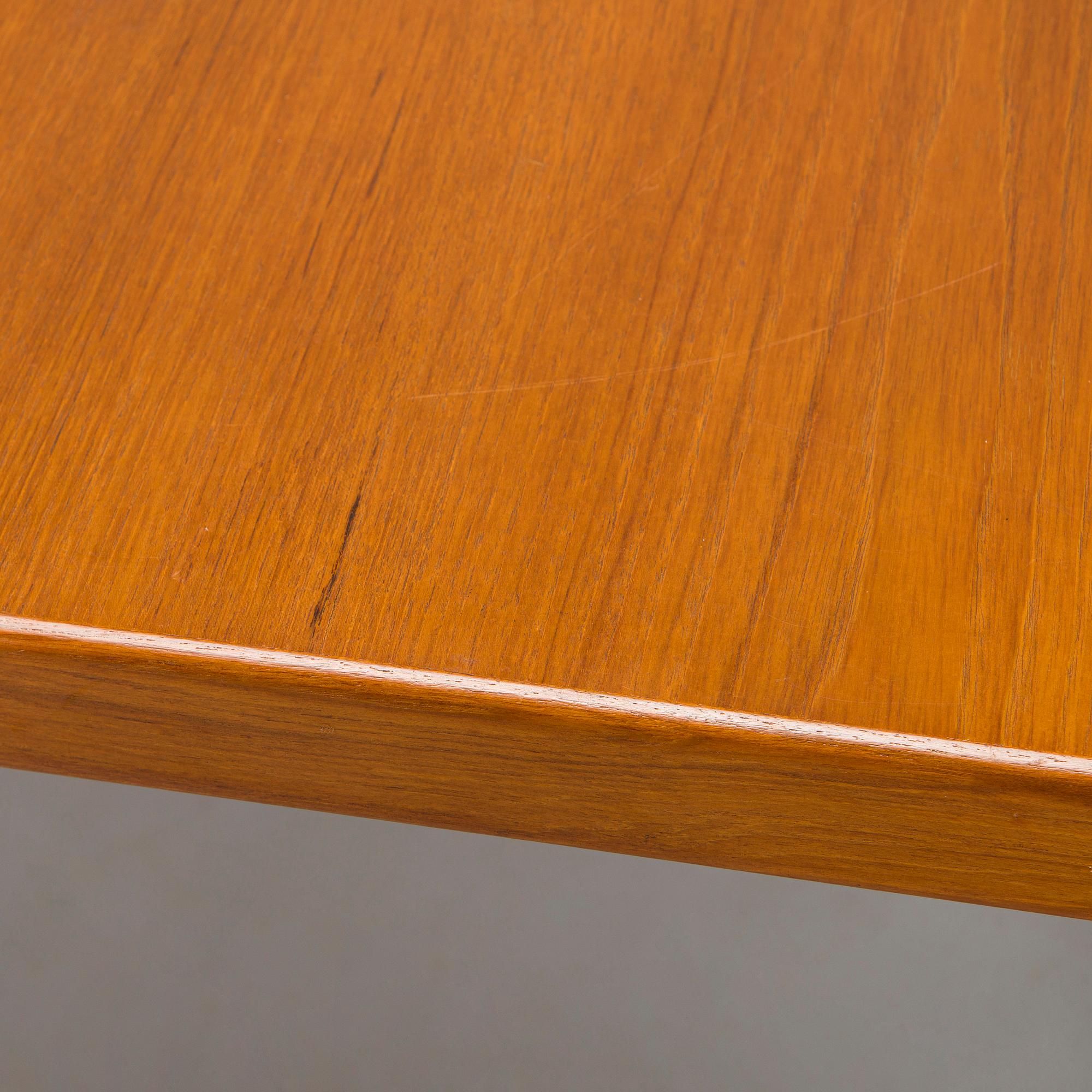 A mid-20th century dining table.