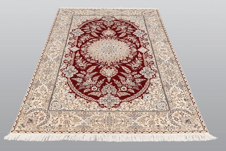 A carpet, Nain part silk s.k 6LAA, 239 x 155 cm.