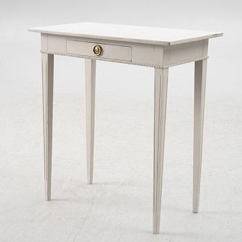 A Gustavian style table, circa 1900.