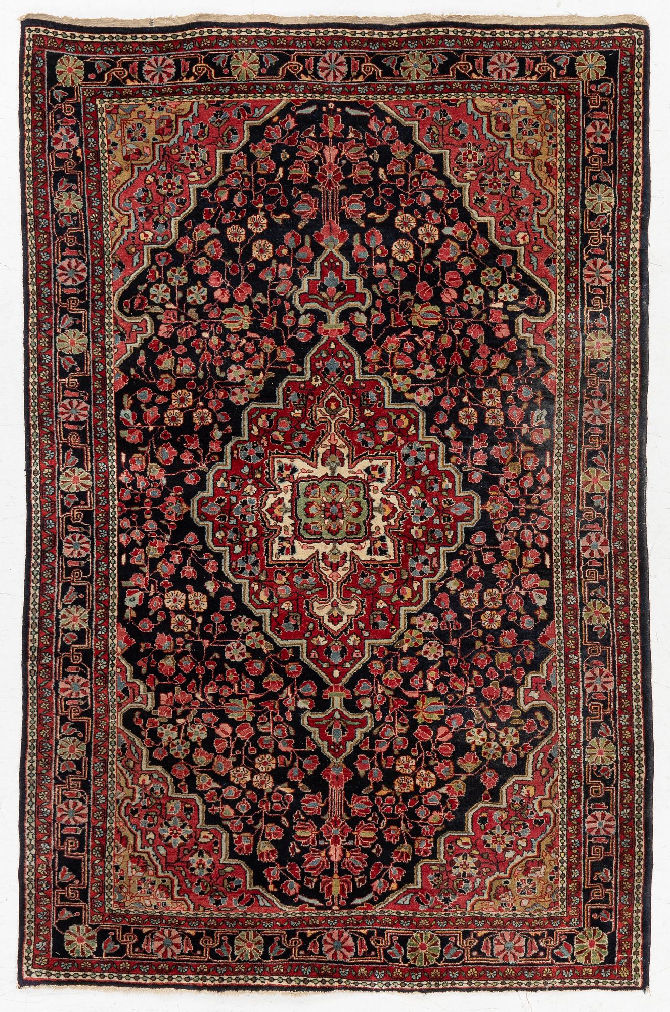 A semi-antique Sarouk rug, west Persia, c. 205 x 131 cm.