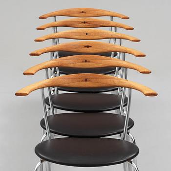 Hans J. Wegner, a set of six "JH-701" oak and black leather chairs by Johannes Hansen, Denmark.