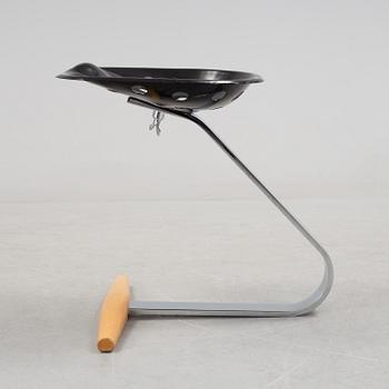 A 'Mezzadro' stool by Achille Castiglione & Pier Giacomo Castiglione for Zanotta, Italy.