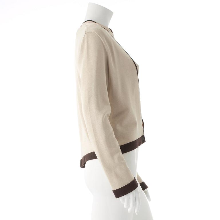 CHANEL, ett tröjset bestående av topp samt cardigan.
