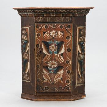 A Swedish corner cabinet from Dalarna, dated "Anno 1800".