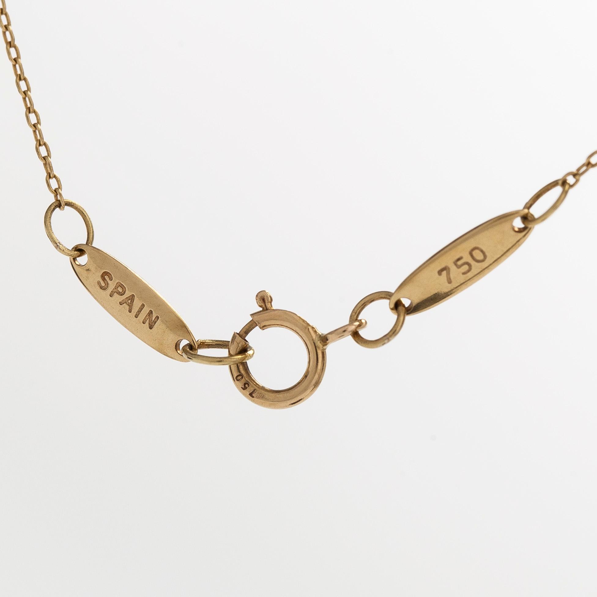 Tiffany & Co, Elsa Peretti, an 18K gold 'Alphabet Pendant' necklace.