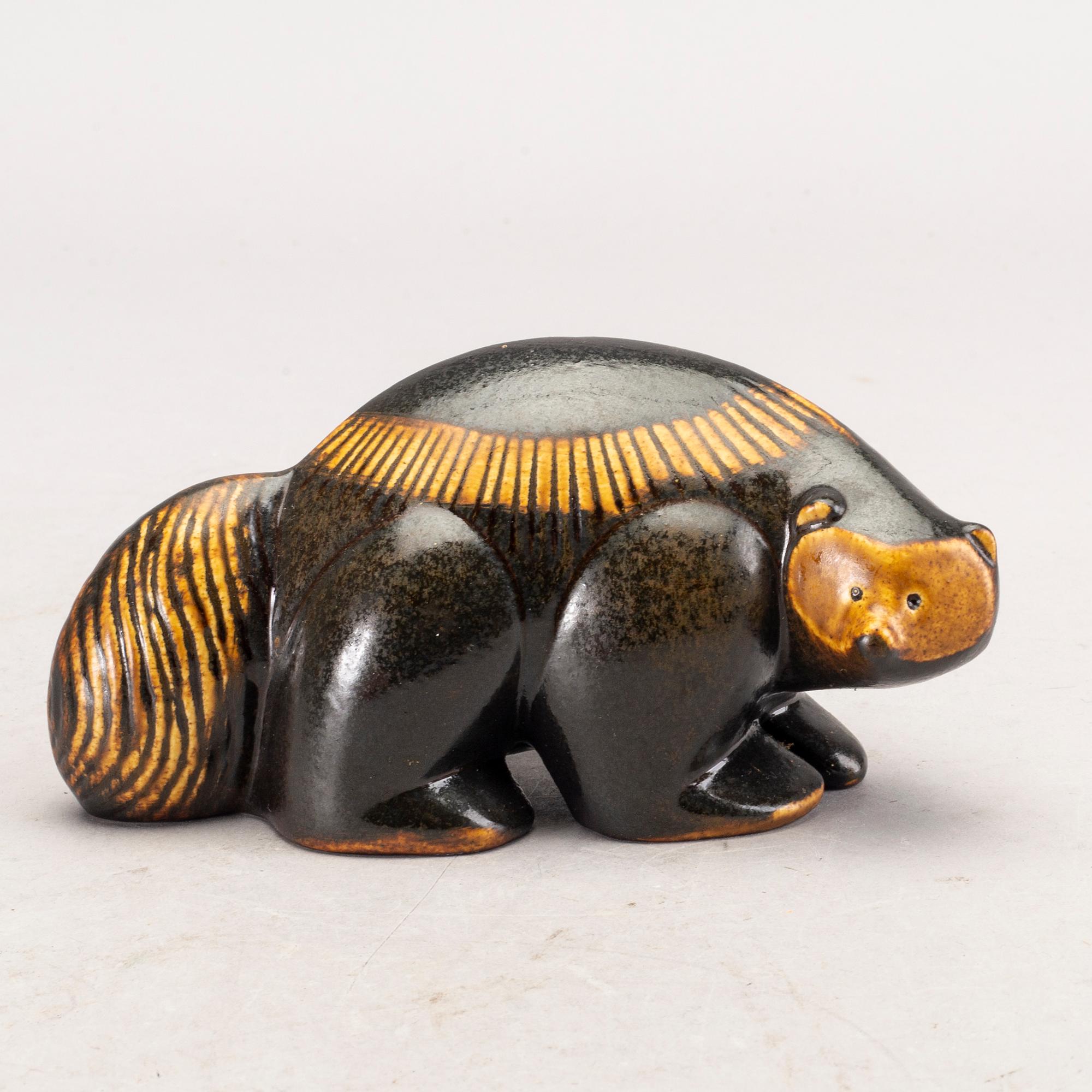 A group of nine ceramic figurines of animals by Lisa Larson A group of nine ceramic figurines of animals by Lisa Larson