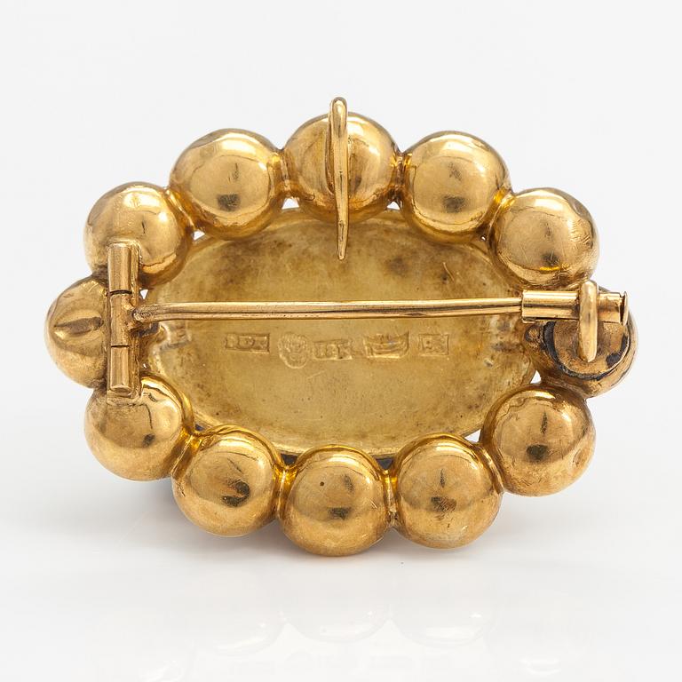 An 18K gold brooch/pendant. Johan Edvard Fagerroos, Helsinki 1862.