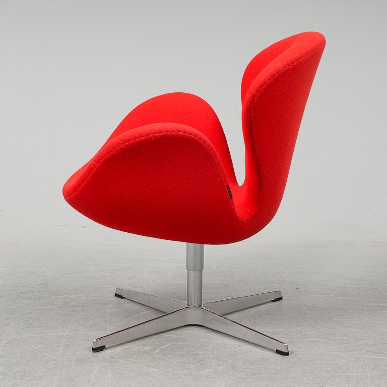 ARNE JACOBSEN, a 'Swan' lounge chair from Fritz Hansen.
