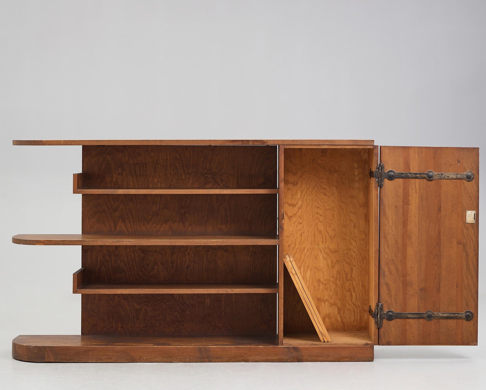Axel Einar Hjorth, a "Lovö" stained pine bookshelf, Nordiska Kompaniet Sweden 1930's.