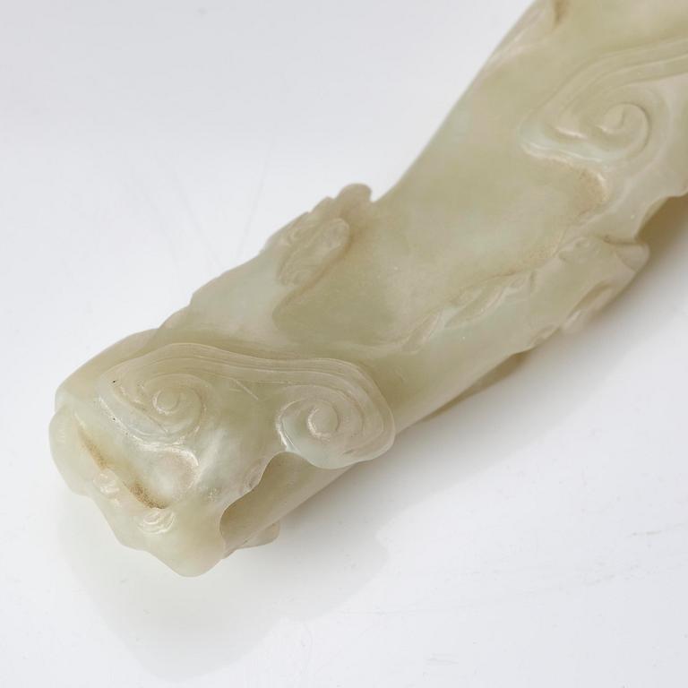 A pale celadon ruyi sceptre, Qing dynasty, 19th century.