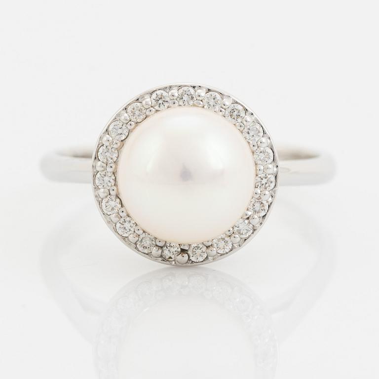 Akoya pearl and brilliant cut diamond ring.