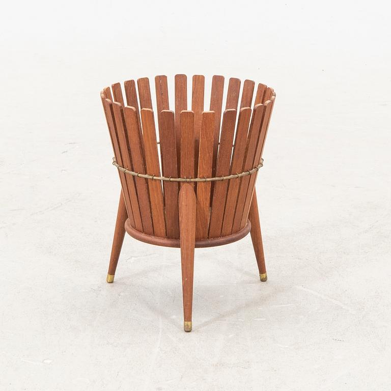 A 1950s teak wastepaper basket.