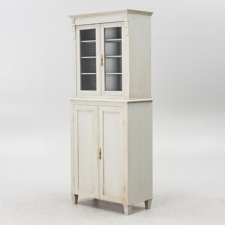 A display cabinet, early 20th century.