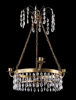 1016. A late Gustavian four-light chandelier.