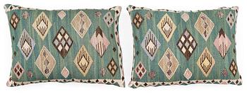 CUSHIONS. one pair. "Knoppen". Gobelängteknik (tapestry weave). 34 x 47  cm each. Signed MMF.