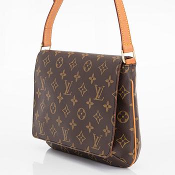 Louis Vuitton, a 'Musette Tango' bag.