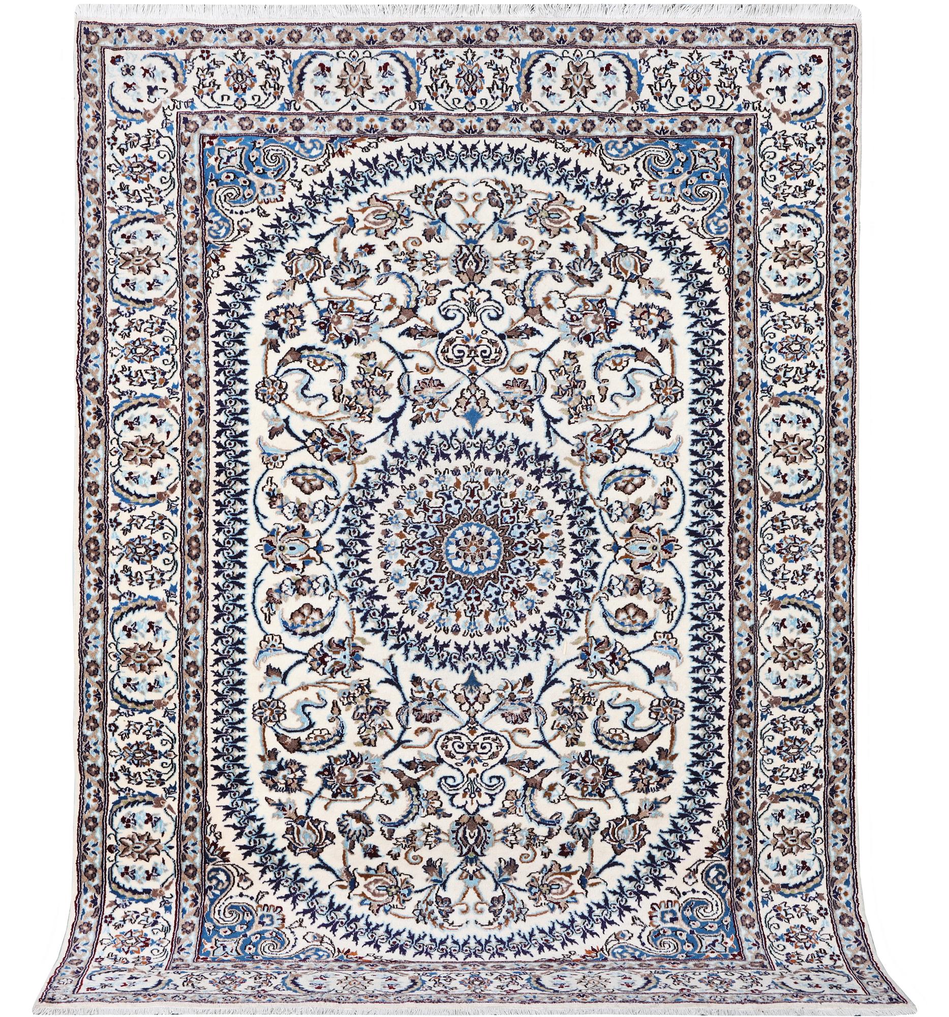 A Nain carpet, part silk, c. 291 x 201 cm.