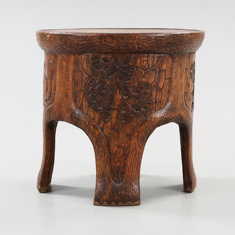 A Gustav Fjaestad Art Nouveau carved pine table by Adolf Swanson, Arvika, Sweden 1908.