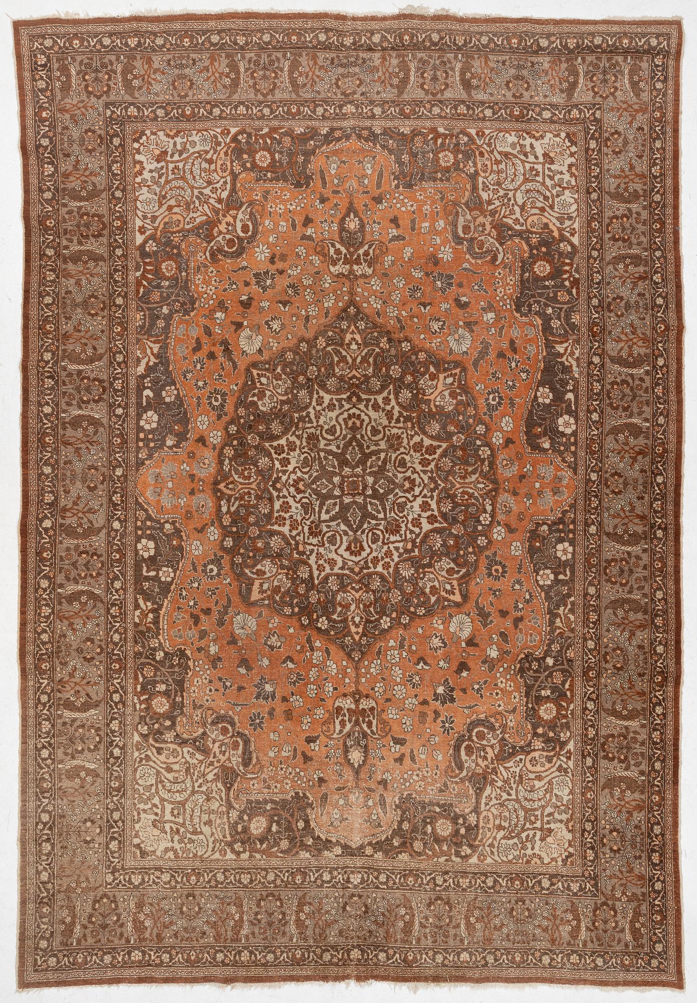 An antique Tabriz carpet, Northwest Persia, 453 x 310 cm.